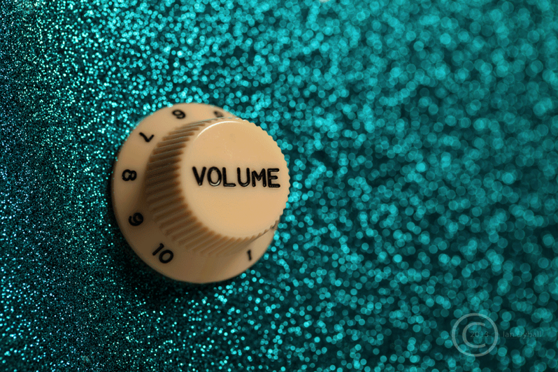 Glam Volume: focus on a guitar volume control - photograph by Ian Dyball